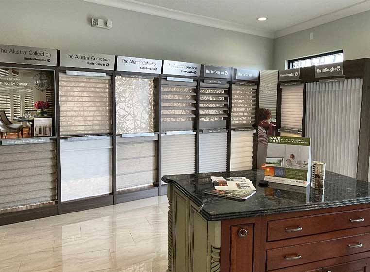 Store interior showcasing several different types of window coverings